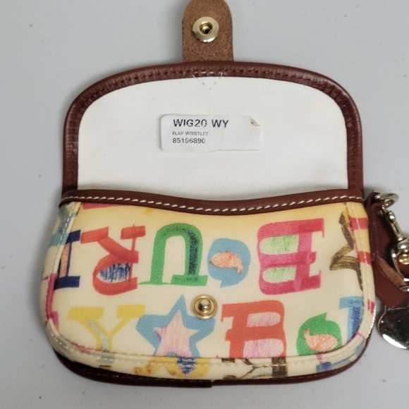 Dooney & Bourke Vintage Pouch Graffiti Canvas Leather Trim. - Picture 14 of 14